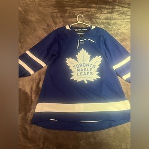 Authentic Toronto maple leafs jersey never worn with tags still.